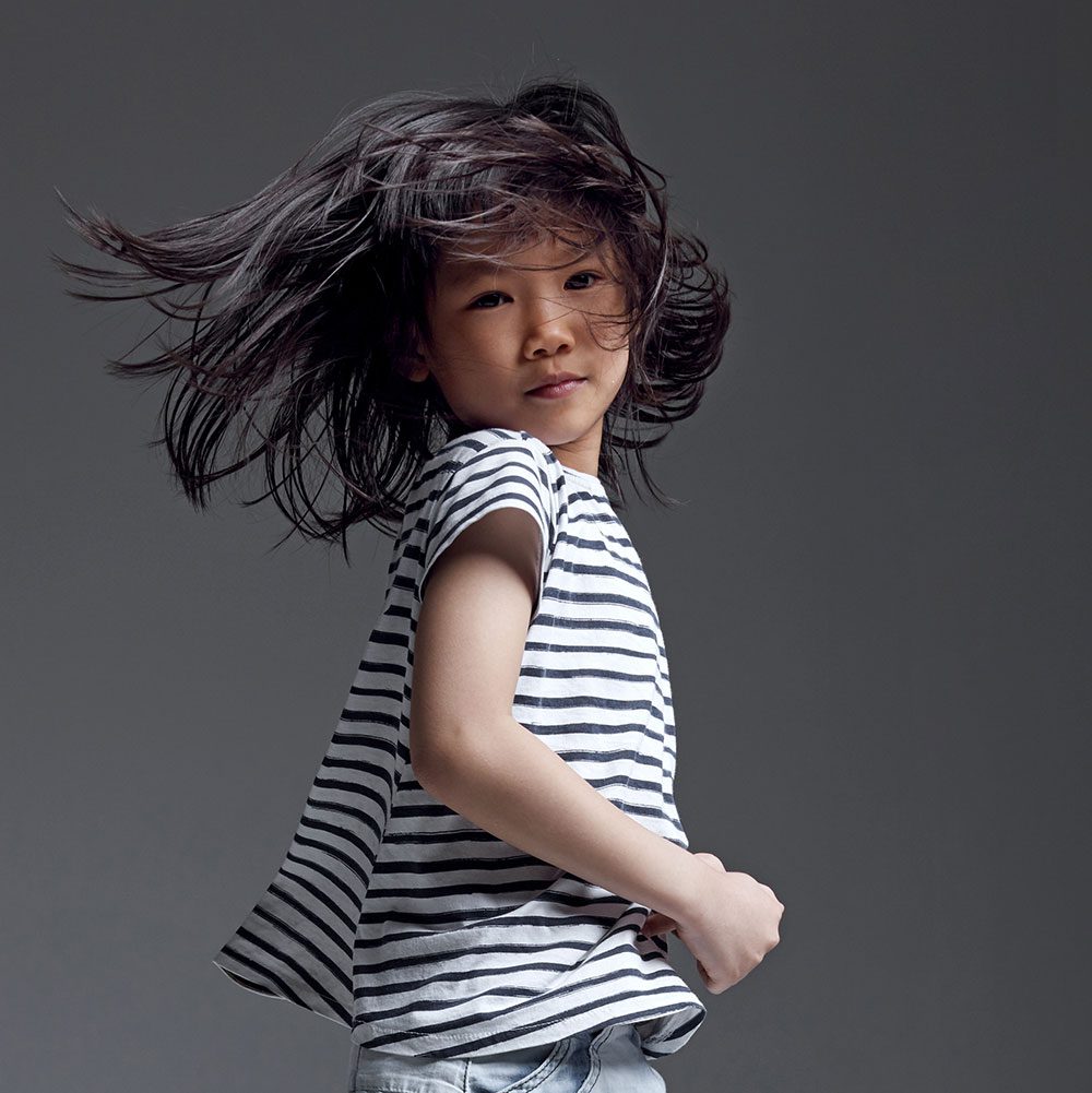 A young girl dancing.